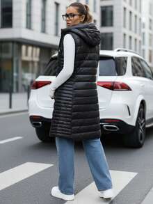 Women's Hooded Quilted Vest, Mid-Thigh Length, Straight Cut, Double Zipper, Side Zipper Pockets, Lightweight Padding, 100% Nylon Fabric, Polyester Lining, Down Vest With Adjustable Hood. - Black - View 3