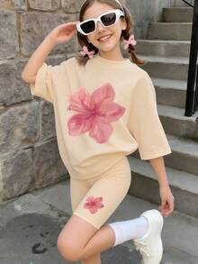 两件套少女度假风套装，芙蓉花印花宽松T恤，骑行短裤，适合朋友购物、周末聚会、日常休闲穿着 - 杏色 - 查看 1