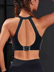 Áo ngực thể thao nữ không đường may, màu trơn, cổ tròn, thích hợp cho tập yoga, tập thể dục, có đệm mút tháo rời, kiểu dáng thời trang, chất liệu dệt kim. - màu đen - Xem 4