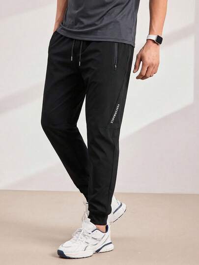 Driftmere Pantalones deportivos para hombres con cintura con cordón y bolsillo con cremallera, ligeros y transpirables, adecuados para fitness, ciclismo, actividades al aire libre, natación, correr y otros deportes, de secado rápido y refrigerantes, de tela elástica, esenciales para el otoño