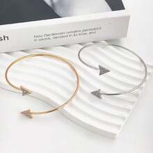 The New Bracelet With Adjustable Closure Features A Diamond-Studded Arrow-Shaped Design And Adjustable Size. - Gold - View 3
