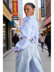 一件女士时尚短款优雅上衣，采用双面弹力下摆设计，弹性极佳，适合夏季春季穿着。 - 淡紫色 - 查看 1