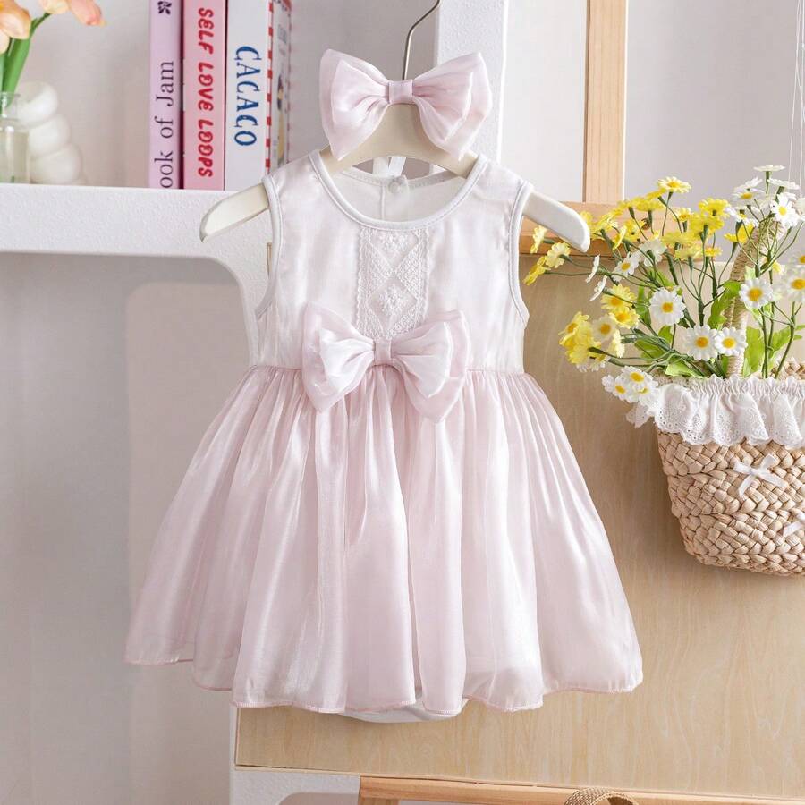 Bộ 2 món gồm váy liền thân và băng đô công chúa không tay, dễ thương, kiểu dáng thường ngày, có nơ, chất liệu lưới, thích hợp cho bé gái, thích hợp mặc mùa hè. - Màu Hồng baby - Xem 1