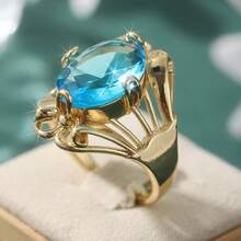 Anillo vintage con tono de cobre, incrustado con piedra de zirconia sintética azul ovalada - Dorado - Ver 4