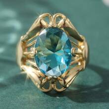 Anillo vintage con tono de cobre, incrustado con piedra de zirconia sintética azul ovalada - Dorado - Ver 2