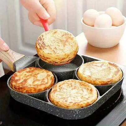 Actualice su juego de desayuno con esta olla de huevo de 4 hoyos antiadherente para hotel/comercial