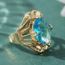 Anillo vintage con tono de cobre, incrustado con piedra de zirconia sintética azul ovalada - Dorado - Ver 6