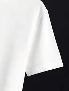 Camiseta holgada para hombre con estampados de bolsa de dinero, símbolo de dólar y monedas, junto con estampados de frases coloridas. Ofrece un aspecto casual y elegante, fácil de lograr un estilo relajado. Es agradable al tacto y transpirable, resistente a la deformación incluso después de un uso prolongado, lo que la hace cómoda para el transporte diario y las salidas. - Blanco - Ver 3