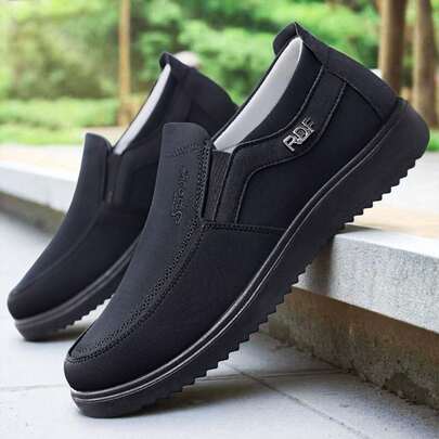 Sapatos casuais esportivos masculinos de meia-idade e idosos, com estampa de letras, confeccionados em tecido Beijing. Modelo slip-on, antiderrapantes, resistentes ao desgaste e ideais para escritório, atividades ao ar livre, uso doméstico e todas as estações do ano.