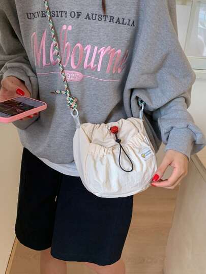 休闲时尚抽绳单肩包，户外运动方形包，学生字母小斜挎包