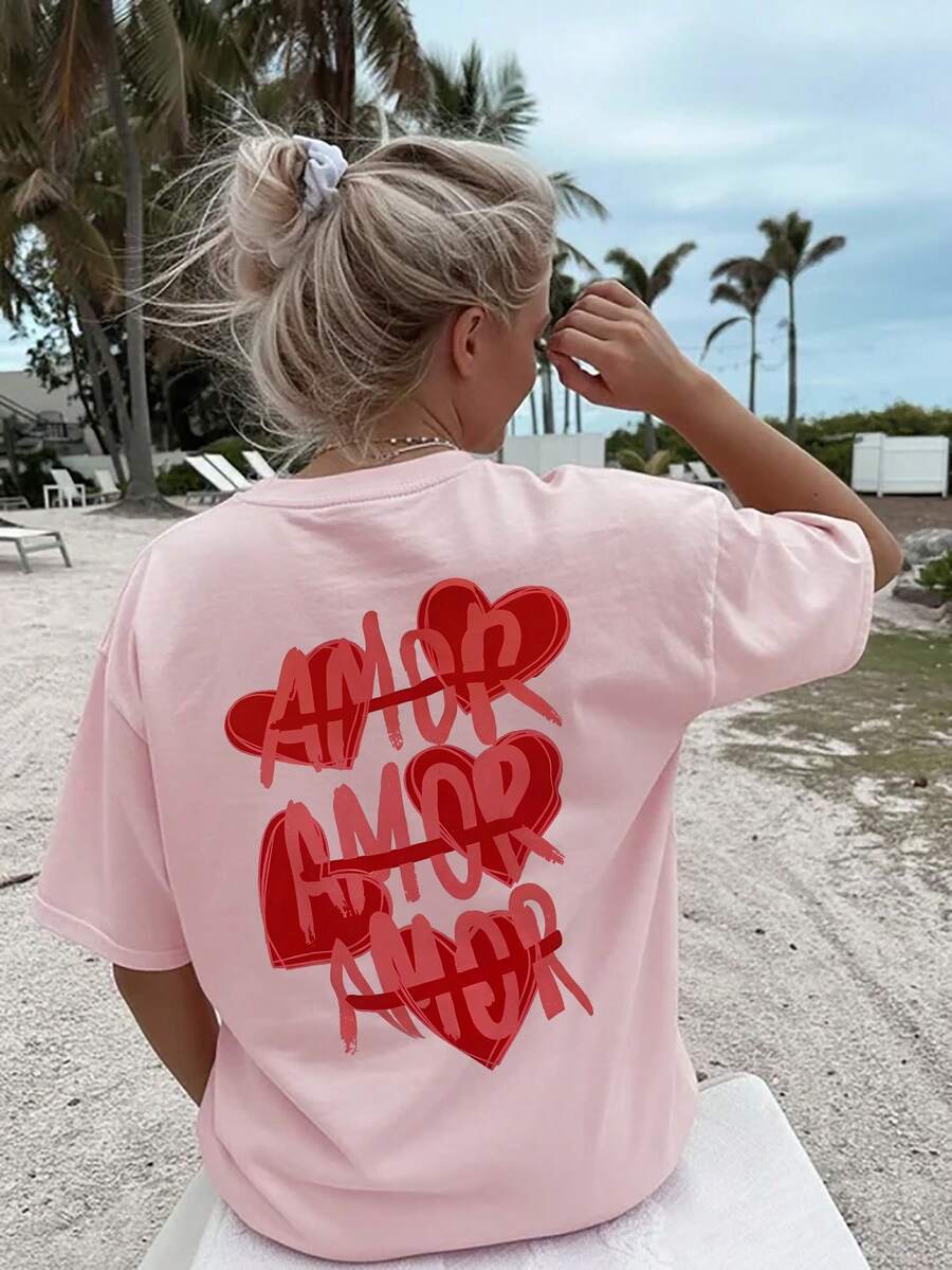 女士夏季情人节新款简约多心印花休闲度假宽松百搭圆领米色短袖T恤，适合日常度假和情人节穿着，粉色