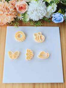 1件春季主题动植物造型聚合物粘土耳环模具，包含蜜蜂、蜗牛、向日葵、蝴蝶等造型，适用于制作聚合物粘土耳环，DIY吊坠耳环，是手工耳环和吊坠的理想选择，也是珠宝制作工具。 - 橘色 - 查看 3