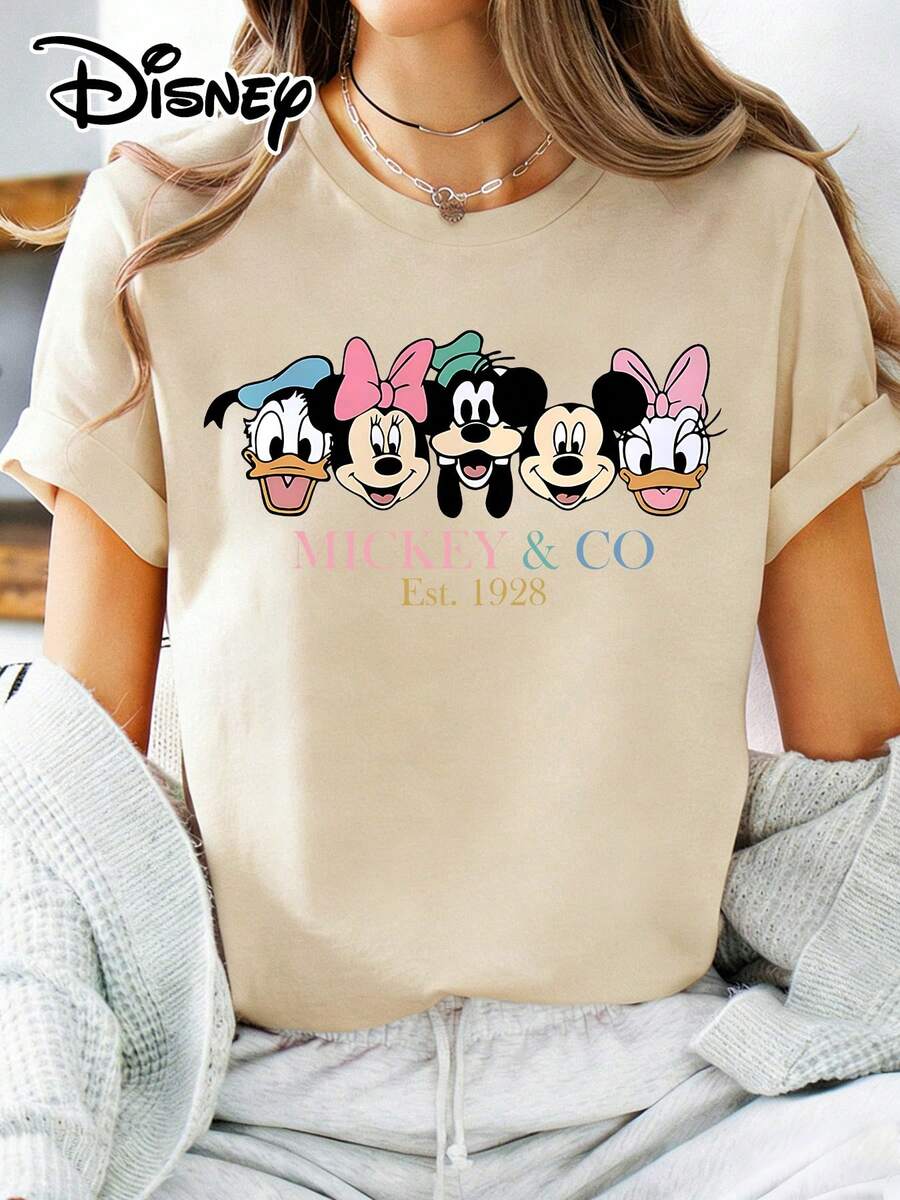 Disney Official Authorization | Women's Street Casual Short-Sleeve T-Shirt, Printed With The Iconic Character Heads Of , , , , And Daisy Duck, Featuring A Retro " & CO Est.1928" Design. Made Of Opaque Fabric, It Is Machine Washable, Versatile And Casual, And Suitable For Spring And Summer Wear. - Apricot - View 1