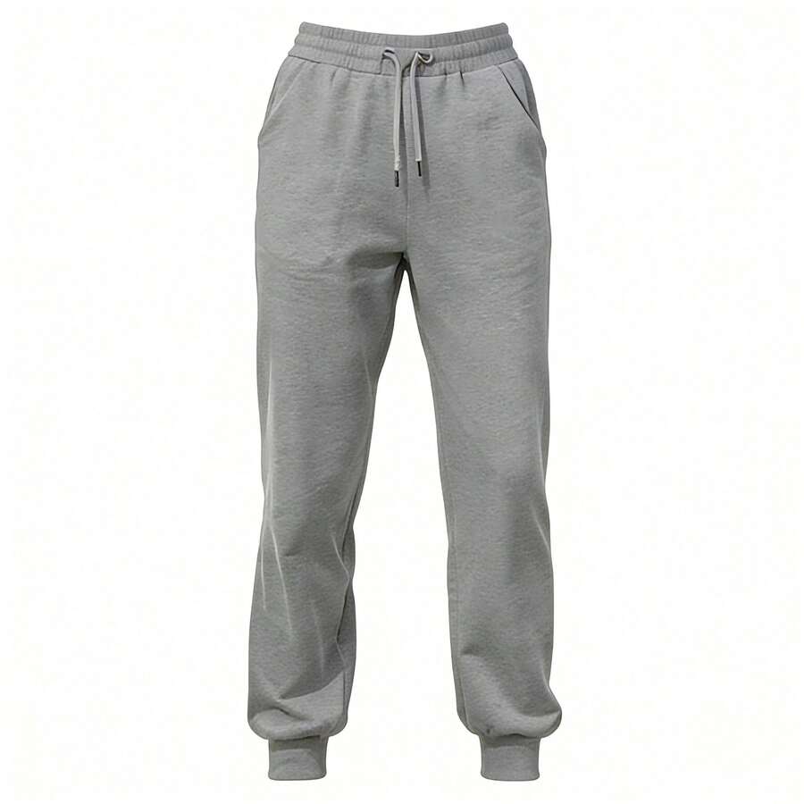 Estos pantalones deportivos de pierna recta están confeccionados en un tejido suave y ligero. Cuentan con una cinturilla elástica con cordón para un ajuste perfecto y bolsillos laterales, ideales para el día a día urbano o para looks informales. - gris - Ver 1