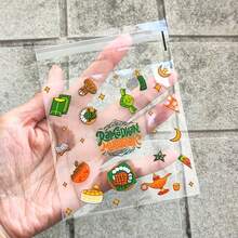 50/100个装绿色透明开斋节包装袋，印有星星、月亮和城堡图案，节日自粘袋，带有阿拉伯风格，四合一混合款 - 适用于斋月和开斋节礼品包装 - 彩色 - 查看 7