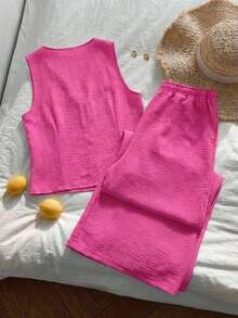conjunto mujer dos piezas rosa fucsia topo sin mangas con lazo frontales y pantalón holgado con textura fresca - Rosa Fucsia - Ver 4