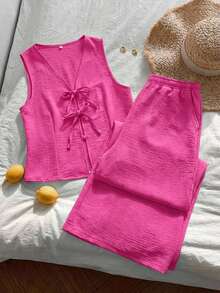 conjunto mujer dos piezas rosa fucsia topo sin mangas con lazo frontales y pantalón holgado con textura fresca - Rosa Fucsia - Ver 5
