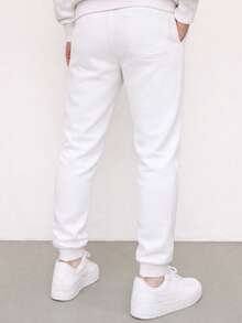 Nes Sport Pants caballero slim fit con franja - Blanco - Ver 2