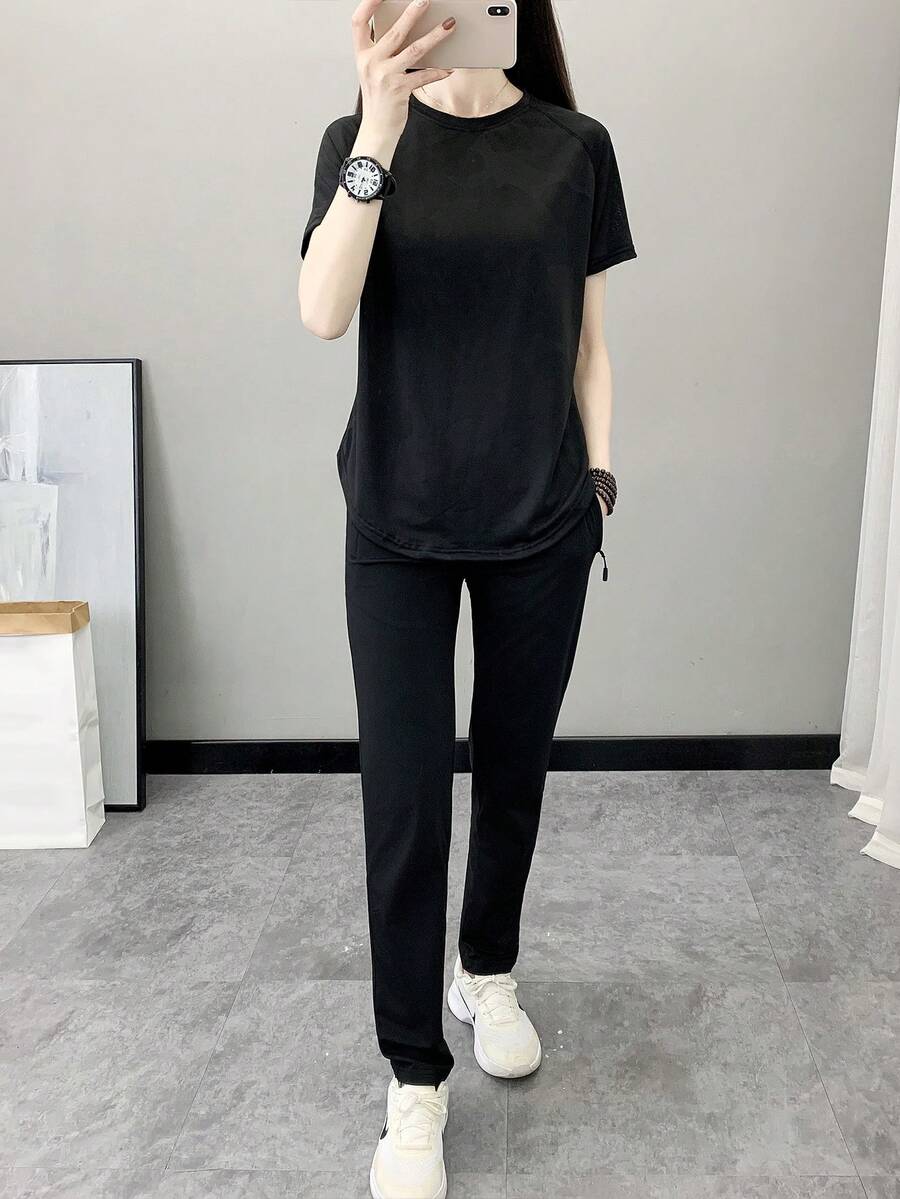 Camiseta de mujer transpirable de malla con parches, para yoga, pilates, fitness, entrenamiento de carrera, color negro, para verano - Negro - Ver 1