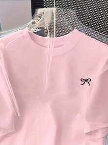 Women's T-Shirt With A Small Bow Print On The Chest, Cute And Delicate Casual Style, New Release Model, 100% Cotton, Exclusive For Spring/Summer. - Màu Hồng baby - Xem 2