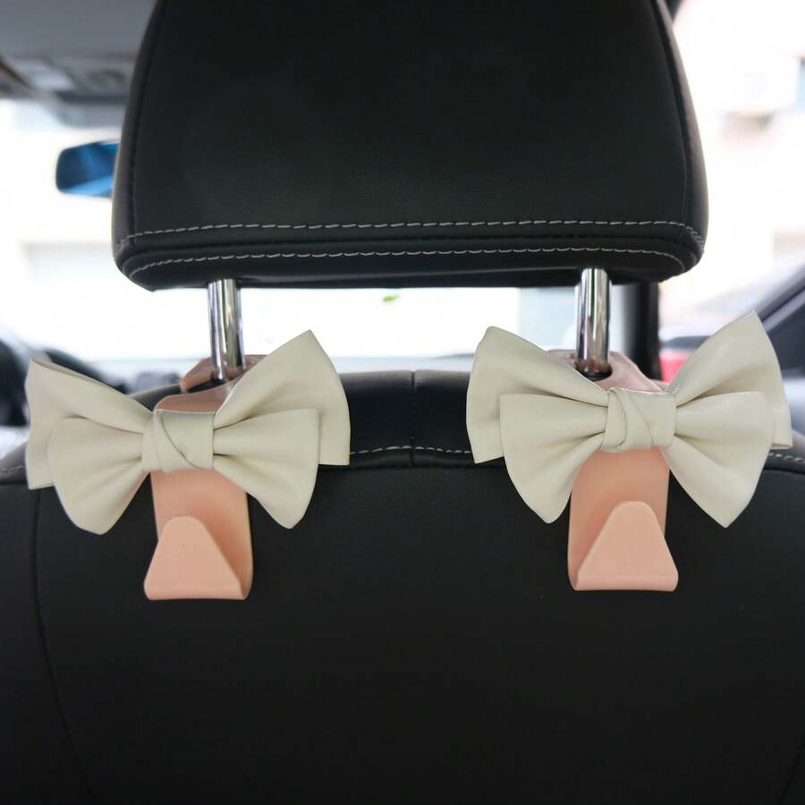 AD Gancho multifuncional de asiento de coche de cuero de alta gama con lazo, gancho de almacenamiento elegante para el interior del coche - rosa y blanco - Ver 1