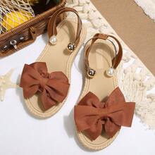 Sandal đế bằng thời trang mềm mại, màu trơn, kiểu nơ, thích hợp cho nữ đi biển hoặc du lịch. - màu nâu - Xem 13