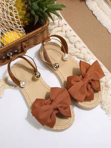 Sandal đế bằng thời trang mềm mại, màu trơn, kiểu nơ, thích hợp cho nữ đi biển hoặc du lịch. - màu nâu - Xem 3