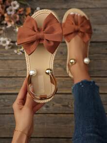 Sandal đế bằng thời trang mềm mại, màu trơn, kiểu nơ, thích hợp cho nữ đi biển hoặc du lịch. - màu nâu - Xem 1