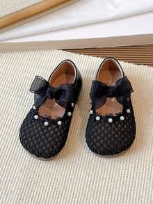 1双黑色蝴蝶结镂空可爱时尚珍珠设计软底防滑平底婴幼儿鞋，适合春、夏、秋、冬四季穿着。 - 黑色 - 查看 5