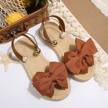 Sandal đế bằng thời trang mềm mại, màu trơn, kiểu nơ, thích hợp cho nữ đi biển hoặc du lịch. - màu nâu - Xem 12