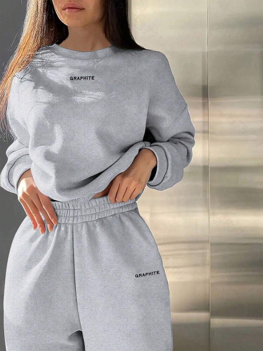 Women's 2 Piece Fleece Sweatsuit Set, Long Sleeve Crewneck Pullover And High Waisted Jogger Pants Tracksuit, Minimalist Graphic Loungewear Matching Set, Casual Airport Outfit Y2K Two Piece Sweatpants Suit, Essential Solid Color Drop Shoulder Sweatshirt & Elastic Sweatpants Set, Cozy Winter Lounge Top And Bottoms - 灰色 - 查看 1