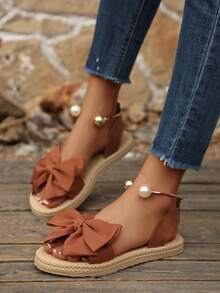 Sandal đế bằng thời trang mềm mại, màu trơn, kiểu nơ, thích hợp cho nữ đi biển hoặc du lịch. - màu nâu - Xem 5