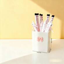 1个蝴蝶结装饰化妆品收纳盒，大容量整理盒，可收纳化妆刷、桌面物品、浴室用品和卧室配件，适合度假、海滩、浴室、卧室等场合。 - 彩色 - 查看 16