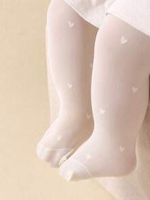 Bộ áo liền quần thời trang màu be cho bé gái, họa tiết trái tim, thích hợp cho bé gái. Bộ áo này rất phù hợp để mặc vào mùa hè, có thể phối cùng chân váy nhỏ, vừa thoáng mát vừa chống nắng. - Nhiều màu - Xem 10