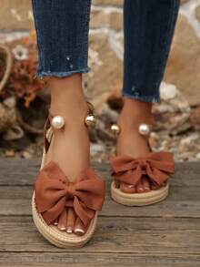 Sandal đế bằng thời trang mềm mại, màu trơn, kiểu nơ, thích hợp cho nữ đi biển hoặc du lịch. - màu nâu - Xem 6