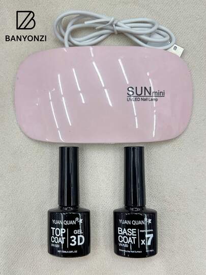 Set de 3 piezas que incluye top coat, base coat y lámpara UV mini mouse. Lámpara UV portátil y plegable para secar el esmalte en gel. Incluye top coat y base coat transparentes de 10 ml cada una.