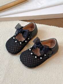 1双黑色蝴蝶结镂空可爱时尚珍珠设计软底防滑平底婴幼儿鞋，适合春、夏、秋、冬四季穿着。 - 黑色 - 查看 3
