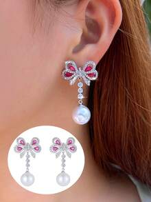 一对优雅设计的蝴蝶结红色立方氧化锆长珍珠吊坠耳环，适合订婚派对佩戴，镀银首饰 - 紅色 - 查看 8