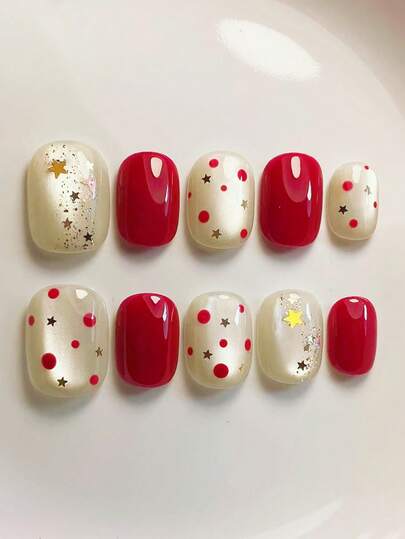 10pcs It Mainly Features The Milky White And Bright Red Color Scheme, Brimming With Festive Charm And Sweetness. Some Of The Nails Are Decorated With Red Polka Dot Details, Complemented By Star Ornaments And Glitter Accents, Which Are Both Lively And Stylish. Handmade Press On Nails