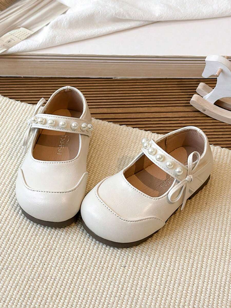1 Pair Beige Bow Knot Cute Fashionable Pearl Design Soft Bottom Non-Slip Flat Children/Baby Shoes, Suitable For Spring, Summer, Autumn And Winter