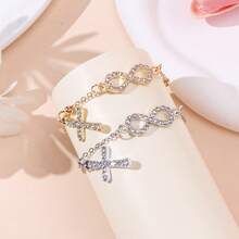 1 pieza Pulsera de cadena de infinito y cruz de aleación con cristales de , adecuada para mujeres - Infinito de 8 caracteres - Ver 5