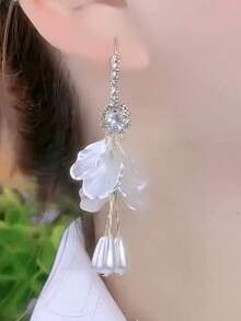 1 par de pendientes largos con diseño de borlas y pétalos, nuevos pendientes de estilo de vacaciones únicos y elegantes para mujeres - Dorado - Ver 5