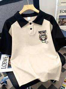 一件复古耳机印花青少年男童Polo衫，采用米色和黑色撞色领口设计，插肩袖。 - 杏色 - 查看 2