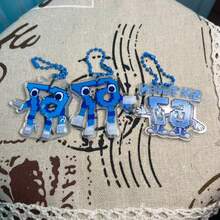 当67像素风格与流行文化玩具的基因相遇，这只蓝白相间的小怪兽便从游戏屏幕跃入现实。它怀旧的马赛克设计，搭配动感十足、伸展开来的双臂，仿佛随时准备给你一个像素风的拥抱。 - 彩色 - 查看 5