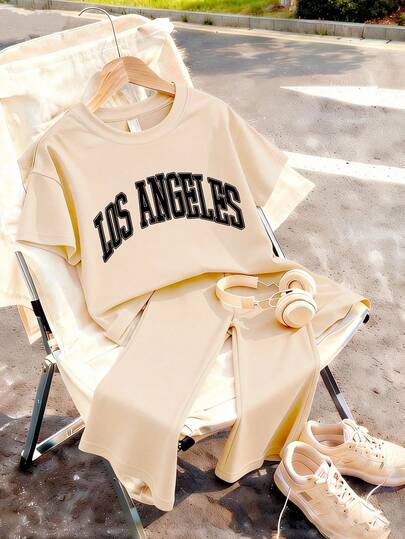 This Casual Girl's Set Includes A Beige Round Neck T-Shirt With Letter Print And A Hand-Held Cup, Paired With Beige Flare Pants. It Is Very Suitable For Going To School, Shopping, Street Style And Vacation. It Is An Ideal Choice For Girls' Daily Wear, And Also A Great Gift For Friends And Family.