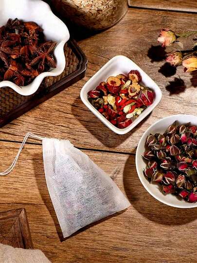 100 túi lọc trà dùng một lần đa năng không dệt, màu trắng, có dây rút, dễ rót và vệ sinh, thích hợp cho cà phê, trà, thảo mộc, gia vị, đóng gói trang sức và gói quà tặng.