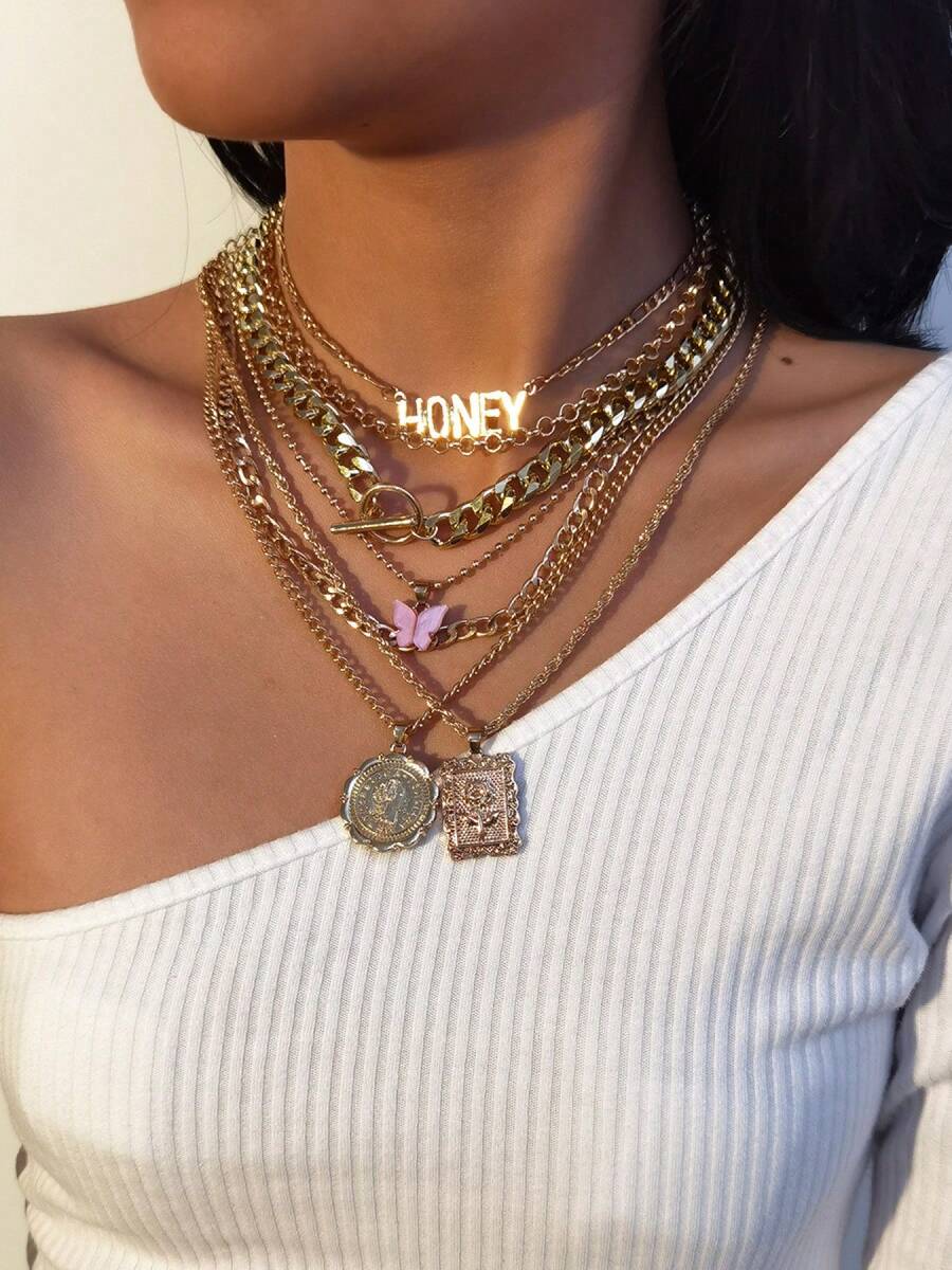 7件套女士金色多层Y2K风格项链套装（包含“HONEY”字母、蝴蝶和硬币吊坠）| 甜美时尚，适合日常、派对和音乐节穿搭 - 金色 - 查看 1