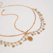 Một chiếc mũ đội đầu hình vỏ sò kiểu Bohemian sành điệu với kim loại, tua rua đính đá và mặt dây chuyền hình tròn không đều. Hoàn hảo cho các cô gái dự dạ hội, đám cưới, tiệc tùng, tụ họp và làm quà tặng cho bạn bè trong dịp Eid Al-Fitr. Phụ kiện tóc tua rua nhiều lớp đính đá lấp lánh kiểu Âu và Mỹ dành cho các cô gái, dây chuyền hình vỏ sò hình học. - Nhiều màu - Xem 8