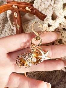 天然不对称贝壳、海星、海螺和海星装饰配件，心形扣环设计，钱包吊坠装饰，适合作为伴娘礼物，海洋风海星贝壳钥匙扣装饰，非常适合女士度假期间日常佩戴，时尚夏季海滩配饰，是母亲节、情人节和其他节日的理想礼物。 - 彩色 - 查看 4