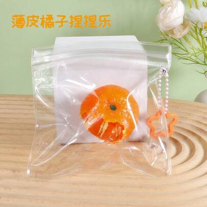 1个2026新款热销逼真可剥橙汁挤压玩具，柔软减压指尖玩具，适合青少年、男孩、女孩互动，与朋友、家人共度美好时光，生日、派对的完美礼物